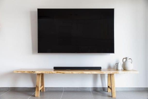 Cómo conectar la barra de sonido a la TV